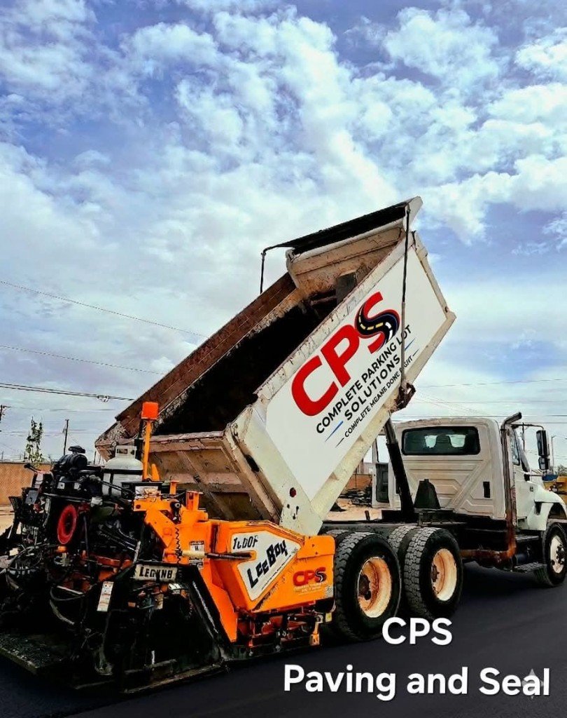 CPS dump truck paving asphalt into LeeBoy paver